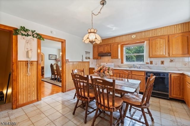 87 S Ridgedale Ave, East Hanover Twp, NJ 07936 - dining space with wainscoting, wood walls, and light floors