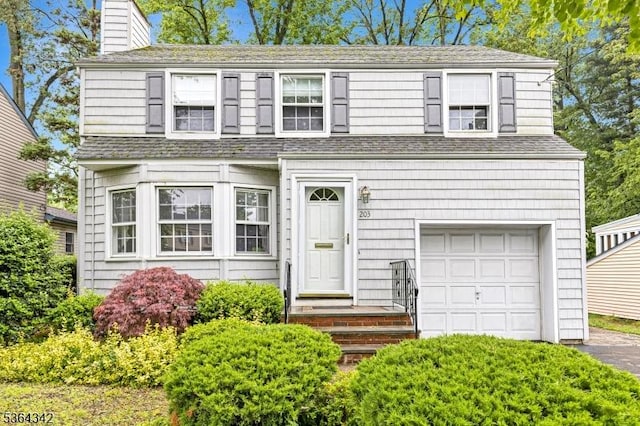 203 Beech St, Cranford Twp, NJ 07016 - view of front of house with an attached garage, a chimney, and roof with shingles