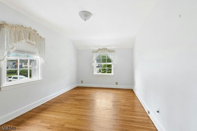 203 Beech St, Cranford Twp, NJ 07016 - empty room featuring light wood finished floors and vaulted ceiling