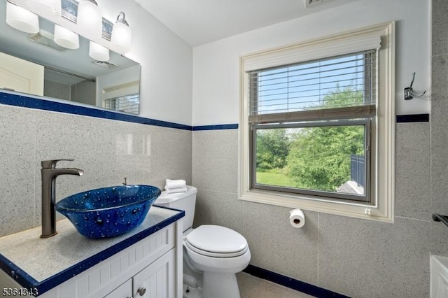 231 Woods Rd, Hillsborough Twp, NJ 08844 - bathroom featuring tile walls and vanity