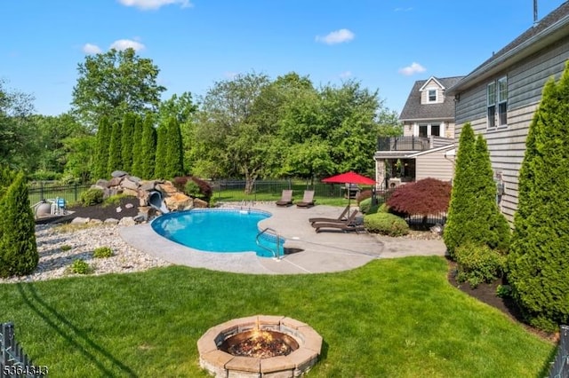 231 Woods Rd, Hillsborough Twp, NJ 08844 - view of swimming pool with a water slide, a fire pit, and a patio