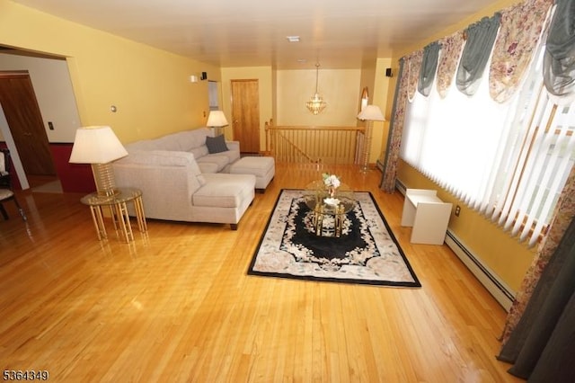 44 Joseph St, Clark Twp, NJ 07066 - living area featuring a baseboard radiator and wood finished floors