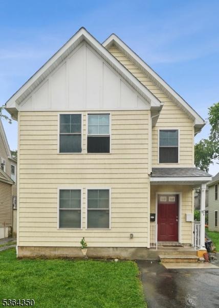 87-A N 18th St, East Orange City, NJ 07017 - view of front of house with a front lawn