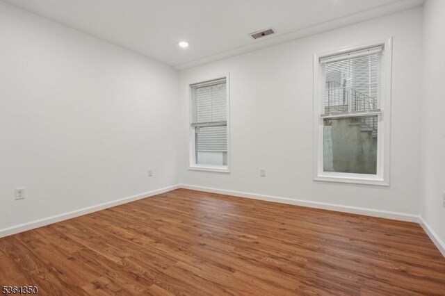 87-A N 18th St, East Orange City, NJ 07017 - unfurnished room featuring wood finished floors and recessed lighting