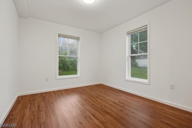87-A N 18th St, East Orange City, NJ 07017 - spare room featuring wood finished floors and baseboards