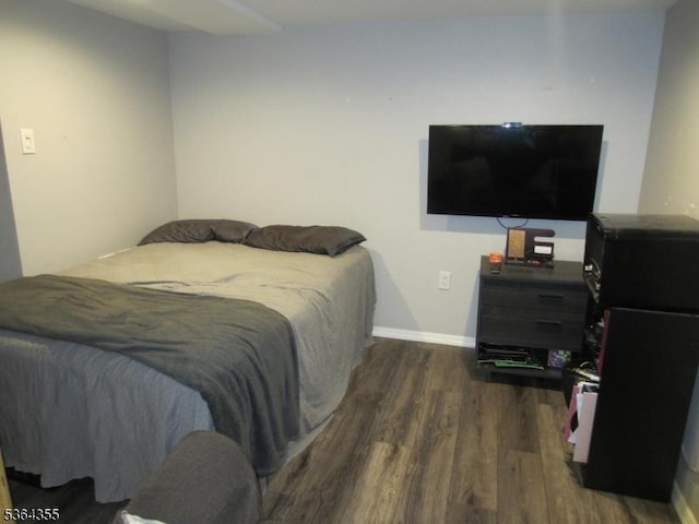 7 Brunswick Ave, Union Twp, NJ 07088 - bedroom featuring dark wood-style flooring and baseboards