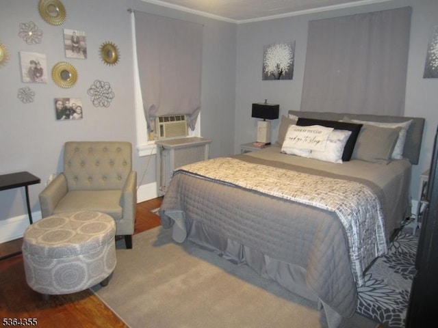 7 Brunswick Ave, Union Twp, NJ 07088 - bedroom featuring radiator heating unit, wood finished floors, and crown molding