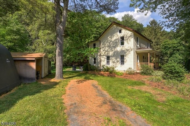 2056 State Route 31, Lebanon Twp, NJ 08826 - view of side of property featuring a yard, a shed, and a porch