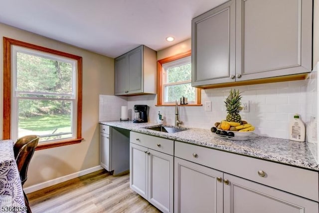 2056 State Route 31, Lebanon Twp, NJ 08826 - kitchen featuring gray cabinetry, light wood-style flooring, tasteful backsplash, light stone countertops, and recessed lighting