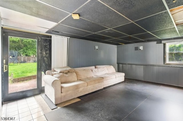 1126-1200 Grant Ave, Plainfield City, NJ 07060 - living room featuring a drop ceiling and wooden walls