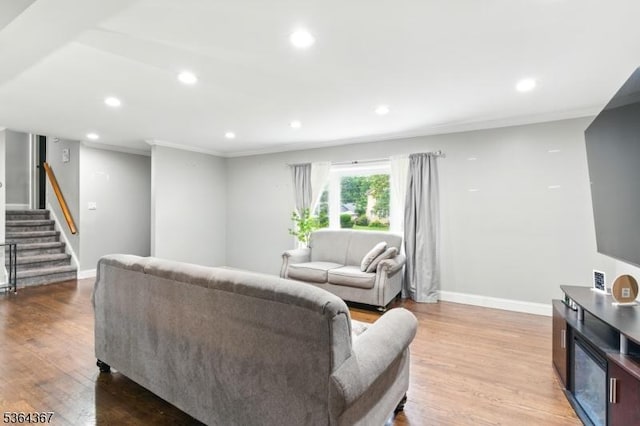 1126-1200 Grant Ave, Plainfield City, NJ 07060 - living area featuring stairway, light wood-style flooring, recessed lighting, and crown molding