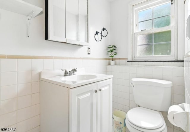 1126-1200 Grant Ave, Plainfield City, NJ 07060 - bathroom with tile walls, vanity, and a wainscoted wall