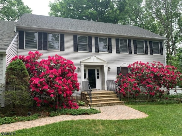 125 Drakestown Rd, Washington Twp, NJ 07853 - colonial home featuring a front lawn and a shingled roof