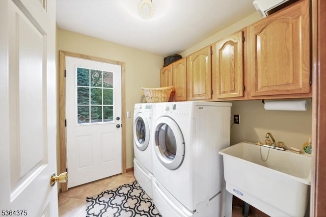 125 Drakestown Rd, Washington Twp, NJ 07853 - laundry room featuring independent washer and dryer, cabinet space, and light tile patterned floors