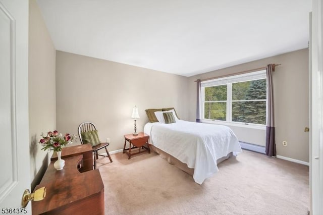125 Drakestown Rd, Washington Twp, NJ 07853 - carpeted bedroom with baseboards and a baseboard radiator
