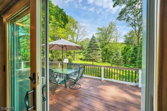 125 Drakestown Rd, Washington Twp, NJ 07853 - deck with outdoor dining space and view of scattered trees