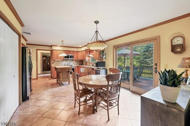 125 Drakestown Rd, Washington Twp, NJ 07853 - dining space featuring light tile patterned floors and crown molding