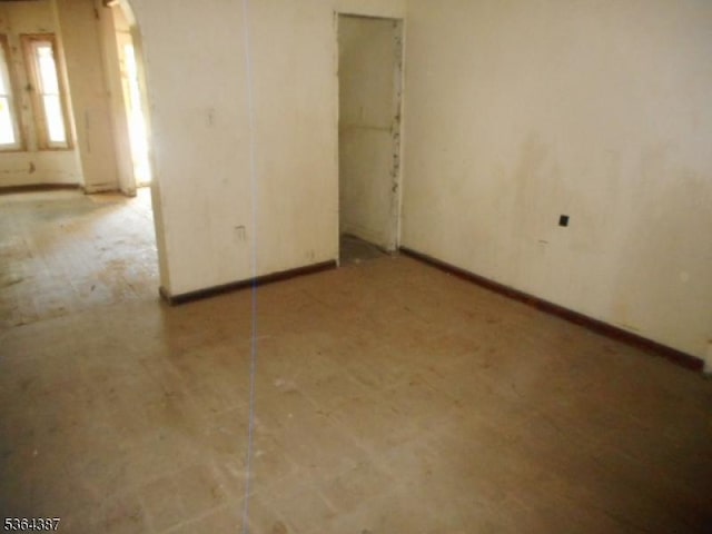 77 Garside St, Newark City, NJ 07104 - unfurnished bedroom with arched walkways and a closet