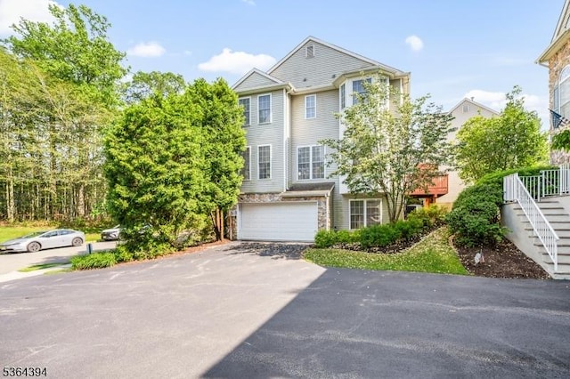156 Arrowgate Dr, Randolph Twp, NJ 07869 - townhome / multi-family property with stairway, driveway, and an attached garage