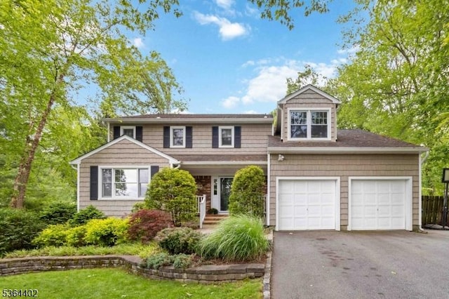 1 Deborah Dr, Morris Twp, NJ 07960 - view of front of property with driveway, an attached garage, and a front lawn