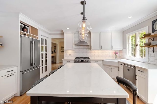 1 Deborah Dr, Morris Twp, NJ 07960 - kitchen featuring open shelves, premium appliances, tasteful backsplash, white cabinetry, and ornamental molding