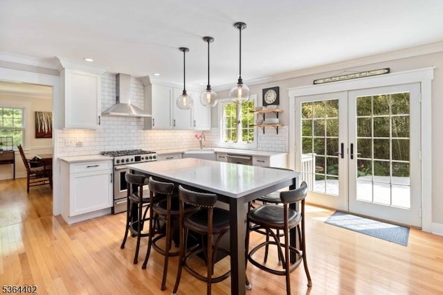 1 Deborah Dr, Morris Twp, NJ 07960 - dining space featuring light wood-style flooring, healthy amount of natural light, french doors, ornamental molding, and recessed lighting