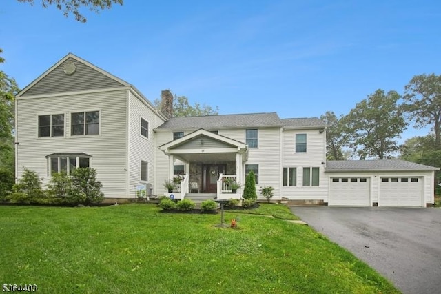 18 Forest Trl, Bernards Twp, NJ 07920 - view of front of home featuring driveway, a front yard, a porch, and an attached garage
