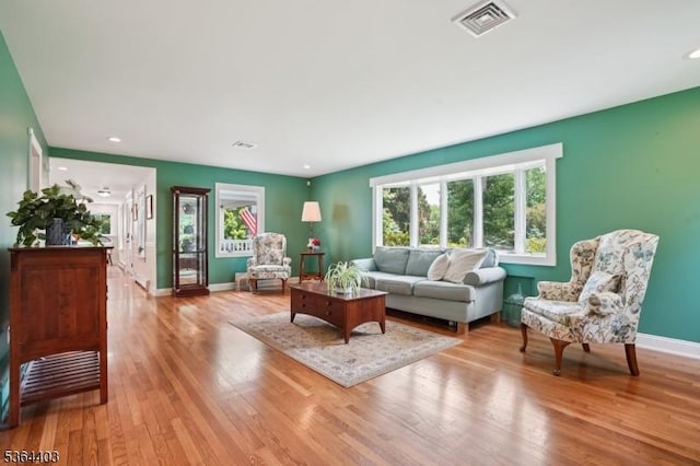 18 Forest Trl, Bernards Twp, NJ 07920 - living area featuring plenty of natural light, wood finished floors, and recessed lighting