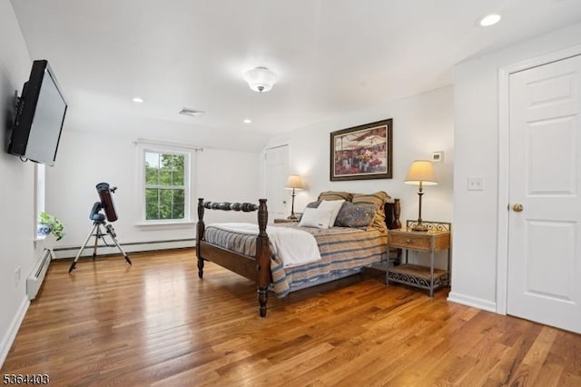18 Forest Trl, Bernards Twp, NJ 07920 - bedroom featuring light wood-style flooring, recessed lighting, and a baseboard radiator