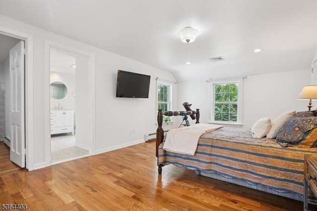 18 Forest Trl, Bernards Twp, NJ 07920 - bedroom featuring light wood-style floors, baseboard heating, connected bathroom, and recessed lighting