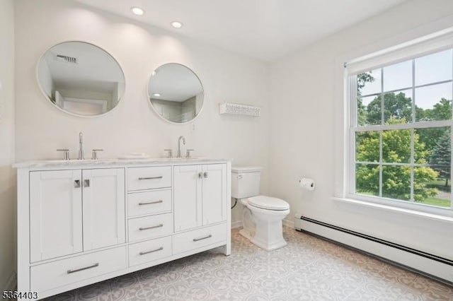 18 Forest Trl, Bernards Twp, NJ 07920 - full bath featuring a baseboard radiator, healthy amount of natural light, double vanity, and recessed lighting
