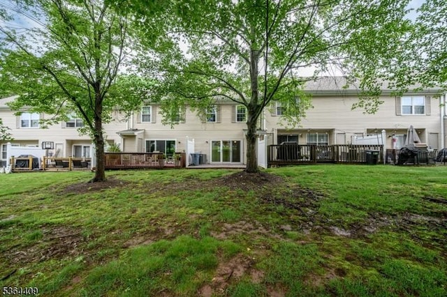 1505 Doolittle Dr, Bridgewater Twp, NJ 08807 - back of house featuring a deck and a lawn