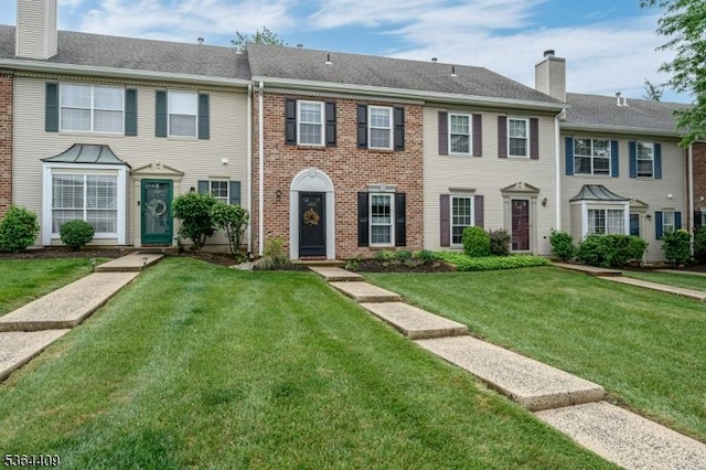 1505 Doolittle Dr, Bridgewater Twp, NJ 08807 - view of property with a chimney, a front yard, brick siding, and roof with shingles
