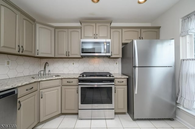 1505 Doolittle Dr, Bridgewater Twp, NJ 08807 - kitchen with stainless steel appliances, tasteful backsplash, light stone countertops, and light tile patterned floors