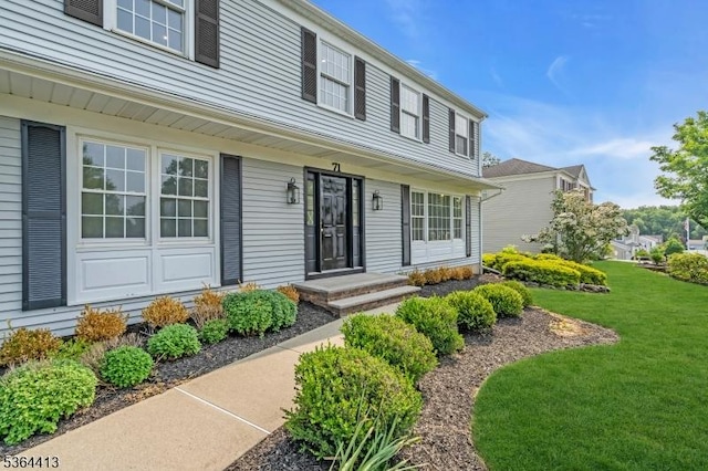 71 Tiffany Dr, East Hanover Twp, NJ 07936 - entrance to property with a lawn