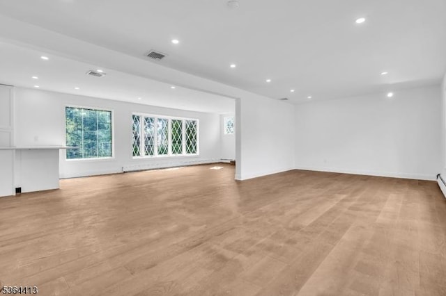 71 Tiffany Dr, East Hanover Twp, NJ 07936 - unfurnished living room featuring recessed lighting and light wood-style floors