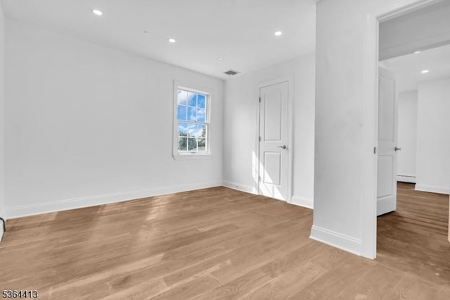 71 Tiffany Dr, East Hanover Twp, NJ 07936 - unfurnished bedroom featuring recessed lighting, wood finished floors, and baseboard heating