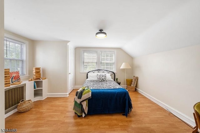 28 Overlook Ter, Maplewood Twp, NJ 07040 - bedroom featuring light wood-style floors and lofted ceiling