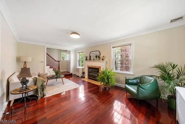 28 Overlook Ter, Maplewood Twp, NJ 07040 - living room featuring ornamental molding, stairway, a tile fireplace, and wood finished floors