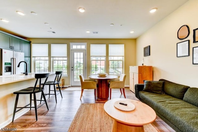 1005 Station Rd, Somerville Boro, NJ 08876 - living room with light wood-style flooring and recessed lighting