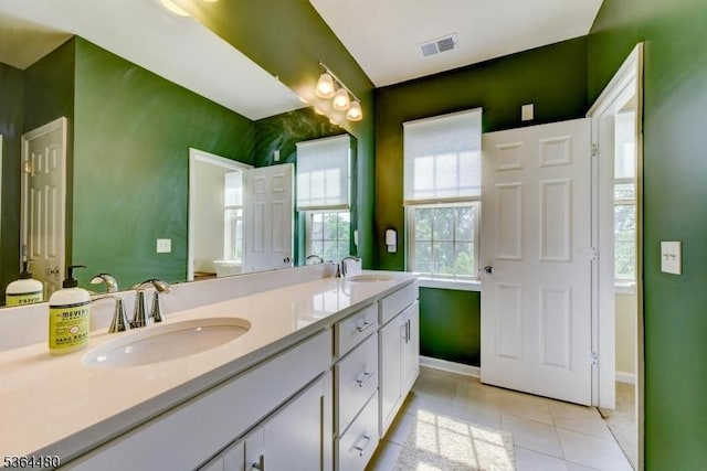 1005 Station Rd, Somerville Boro, NJ 08876 - bathroom featuring double vanity and tile patterned flooring