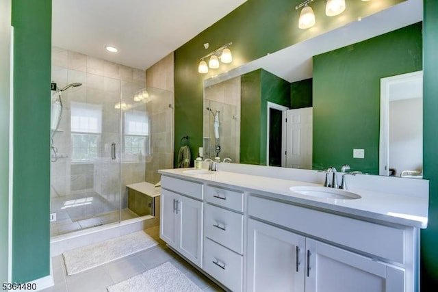 1005 Station Rd, Somerville Boro, NJ 08876 - bathroom with tile patterned floors, double vanity, and a stall shower