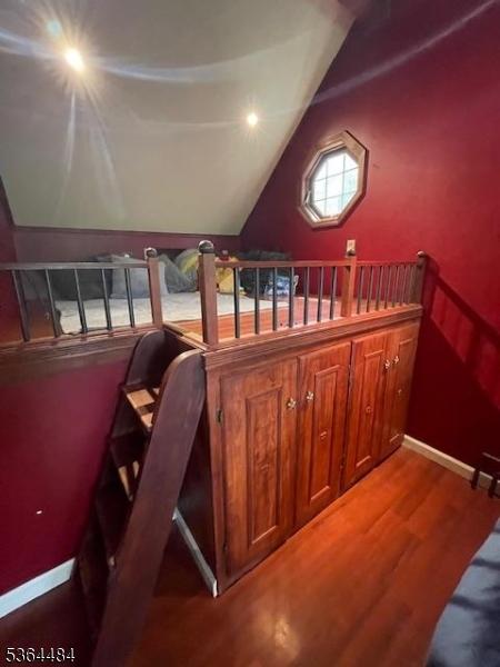 250 Waconia Rd, Vernon Twp, NJ 07422 - stairs with wood finished floors and vaulted ceiling