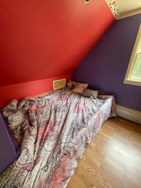 250 Waconia Rd, Vernon Twp, NJ 07422 - bedroom featuring lofted ceiling and wood finished floors