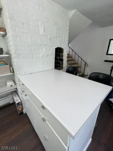 250 Waconia Rd, Vernon Twp, NJ 07422 - office area with dark wood-style floors and a fireplace