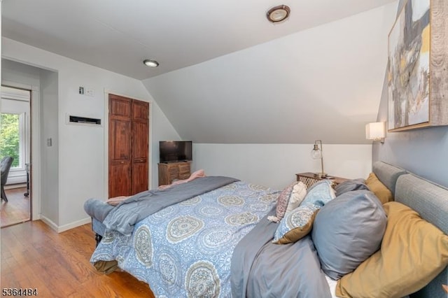 250 Waconia Rd, Vernon Twp, NJ 07422 - bedroom featuring wood finished floors, vaulted ceiling, and a closet