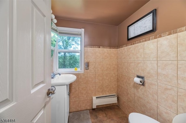 250 Waconia Rd, Vernon Twp, NJ 07422 - bathroom with a baseboard heating unit, tile walls, and vanity