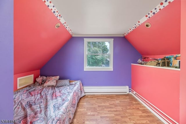 250 Waconia Rd, Vernon Twp, NJ 07422 - bedroom featuring baseboard heating, wood finished floors, and vaulted ceiling