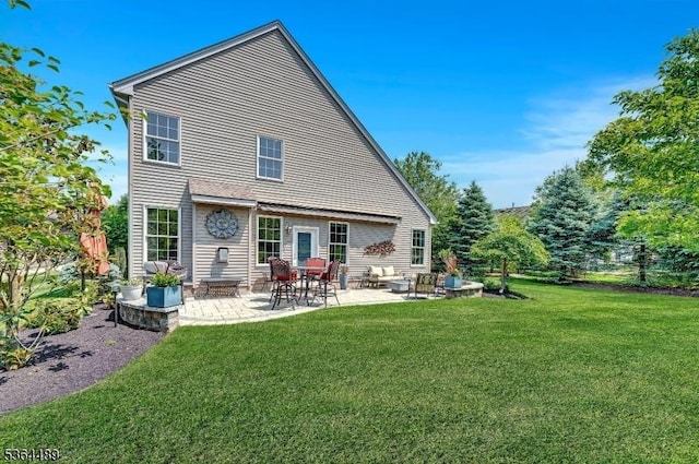 138 Canal Walk Blvd, Franklin Twp, NJ 08873 - rear view of property featuring a yard and a patio