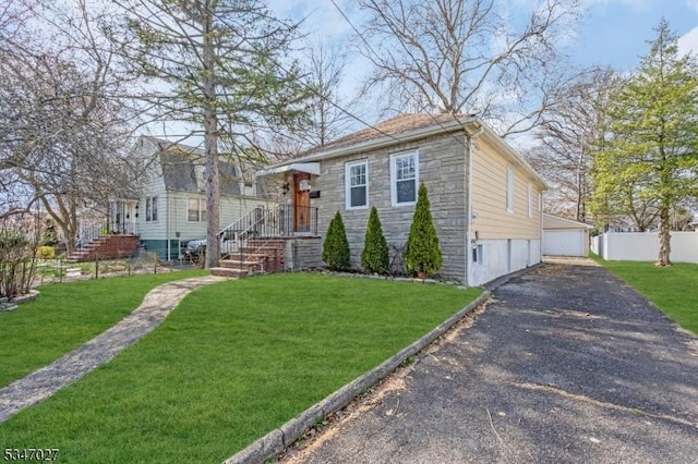 1218 Kline Pl, Rahway City, NJ 07065 - view of front facade featuring stone siding and an outbuilding